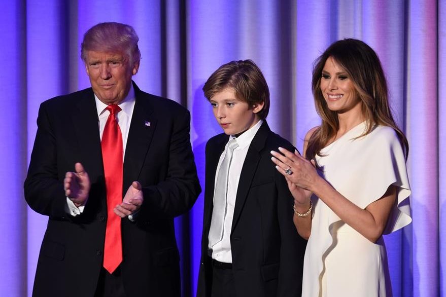 TOPSHOT - US President-elect Donald Trump arrives with his son Baron and wife Melania at the New York Hilton Midtown in New York on November 8, 2016.<br />
Trump stunned America and the world Wednesday, riding a wave of populist resentment to defeat Hillary Clinton in the race to become the 45th president of the United States. / AFP PHOTO / SAUL LOEB